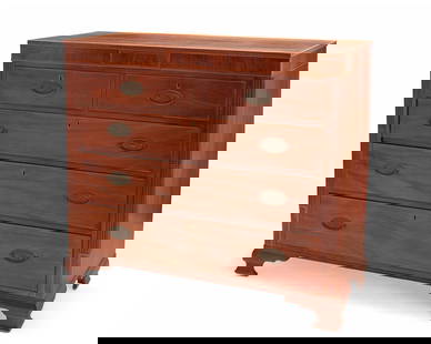 A George III-style mahogany chest of drawers: A George III-style mahogany chest of drawers20th centuryThe wood chest with brass hardware and brass pulls, featuring five drawers centering fluted vertical panels, raised on ogee bracket feet42.25" H