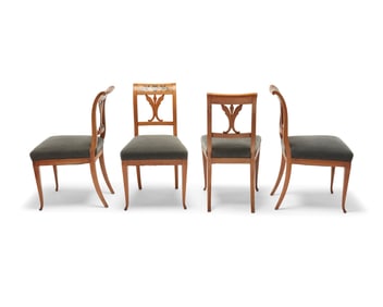 A set of four Biedermeier dining chairs