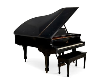 A Steinway & Sons baby grand piano