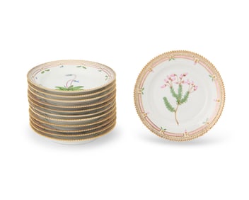 A set of twelve Royal Copenhagen porcelain 'Flora Danica' salad plates