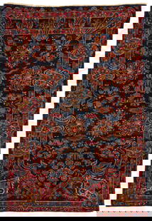 A Fereghan floral prayer rug: A Fereghan floral prayer rugEarly 20th centuryWool on cotton foundation6' 4" L x 4' 7" W