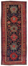 A Caucasian geometric area rug