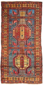 A Caucasian geometric area rug
