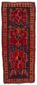 A Caucasian geometric area rug