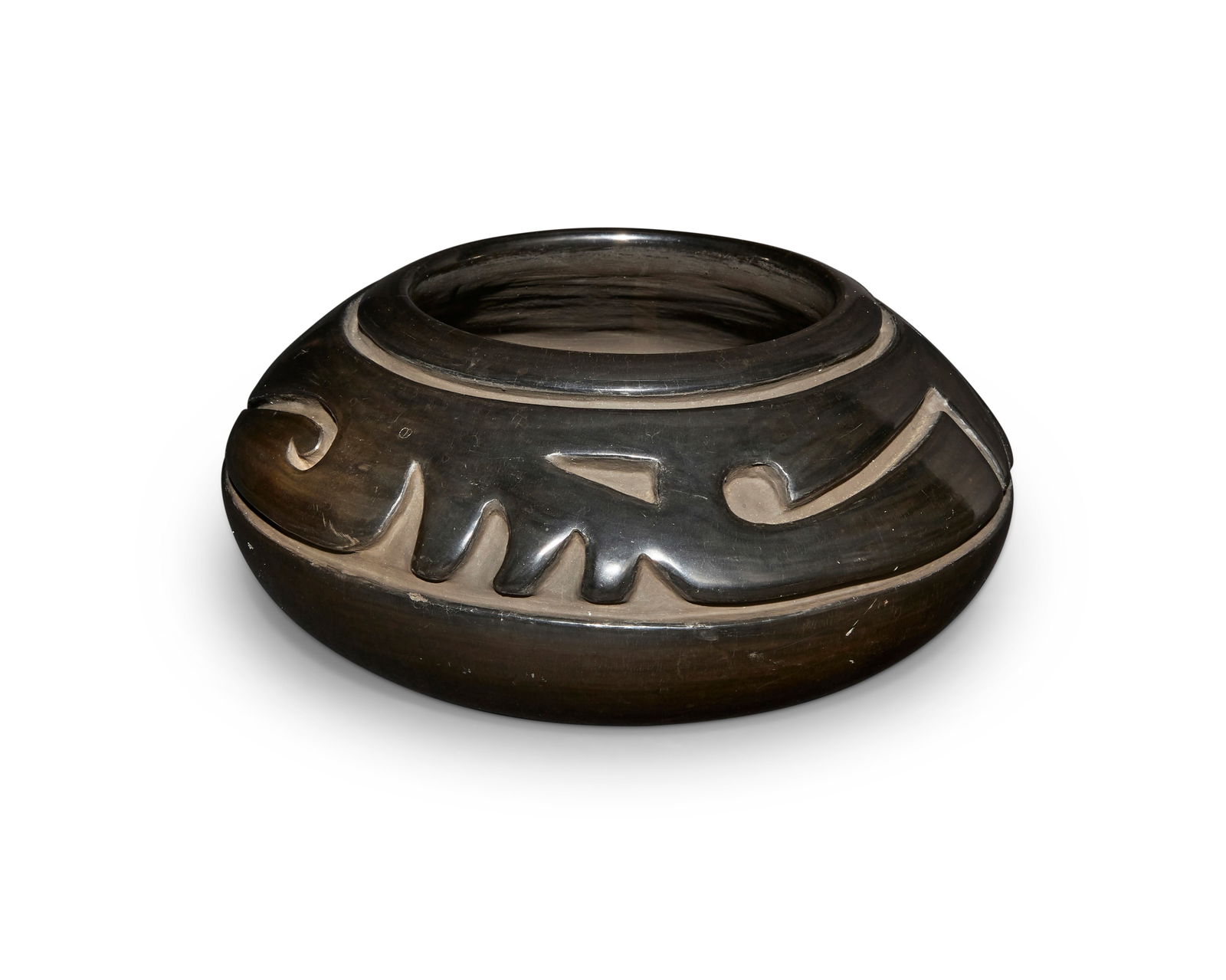 Margaret Tafoya (1904-2001, Santa Clara Pueblo): Margaret Tafoya (1904-2001, Santa Clara Pueblo)A blackware pottery jar, mid/late 20th centuryWith incised signature to underside: Margaret Tafoya / Santa Clara Pue.The stone-polished shouldered jar wi