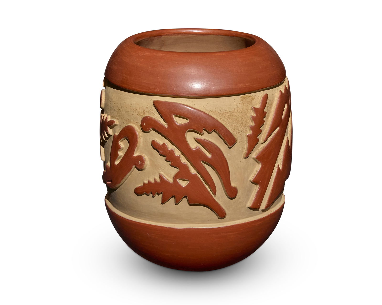 Mary Archuleta (b. 1942, Santa Clara Pueblo): Mary Archuleta (b. 1942, Santa Clara Pueblo)A large redware cylindrical vase, late 20th centuryIncised signature to underside: Mary ArchuletaThe tall deeply carved jar with a wide band of stylized fig