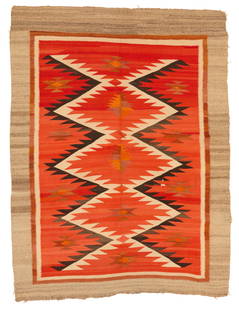 A Navajo regional rug: A Navajo regional rugEarly 20th century, DineWoven in reds, oranges, brown, cream, and grey wool with central stacked Saltillo-style sawtooth diamonds and a banded border.61" H x 45" W approximately