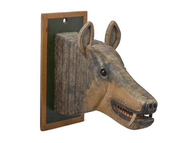 A Folk Art carved wood wolf trophy/plaque