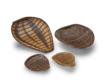 A group of Northern California winnowing tray baskets and beaters