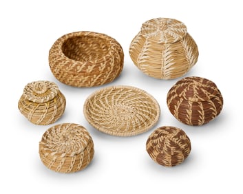 A group of Native American pine needle baskets