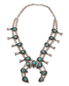 A Southwest silver and turquoise squash blossom necklace