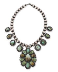 An Ernest Roy Begay Navajo silver and turquoise squash blossom necklace