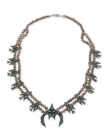 A Southwest silver and turquoise squash blossom necklace
