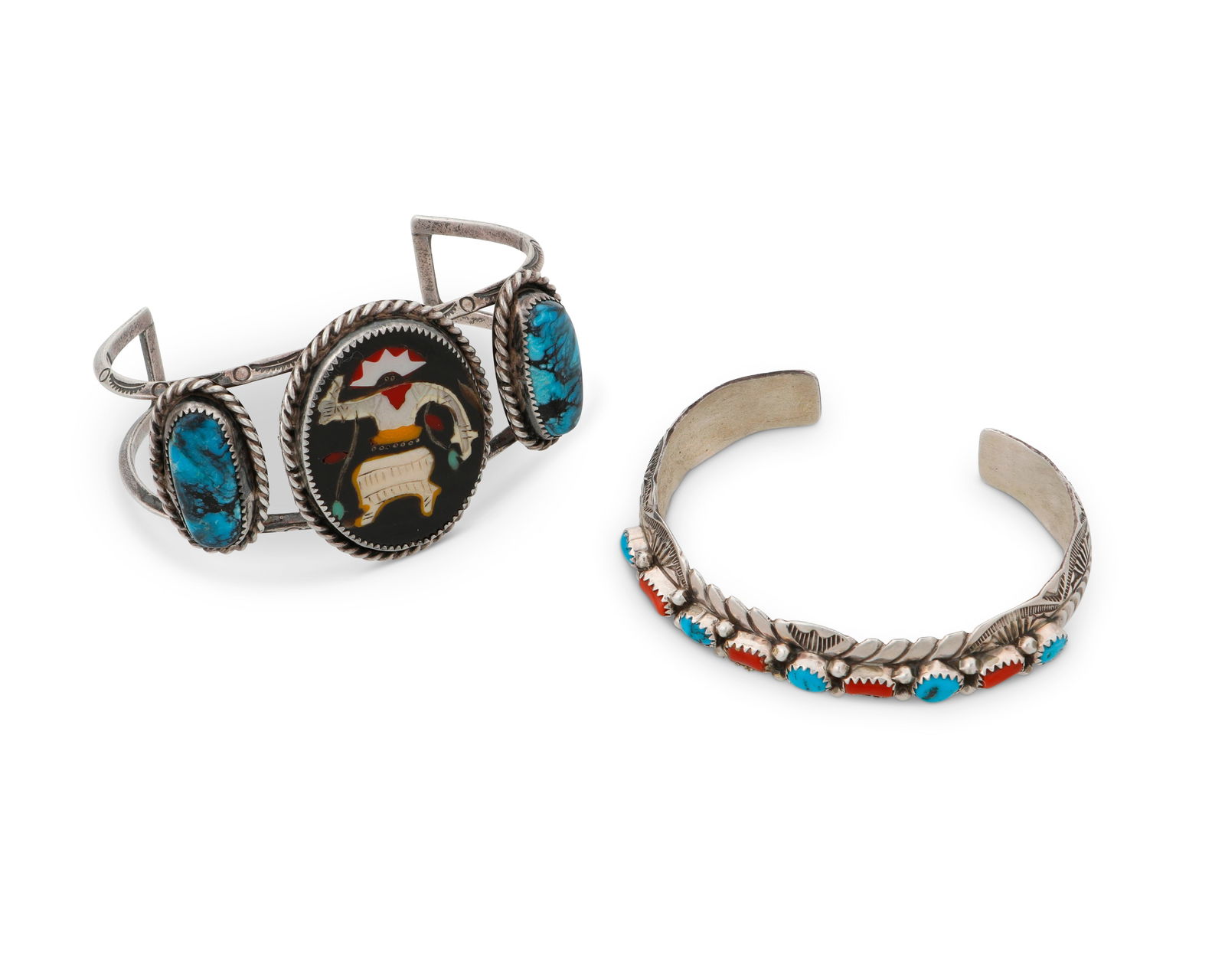 Two Southwest silver and stone set cuff bracelets: Two Southwest silver and stone set cuff braceletsLate 20th/21st centuryTwo works:A Wilbert Benally Navajo sterling silver and stone set cuff(b. 20th century, Dine)Marked: WB / SterlingA narrow cuff wi
