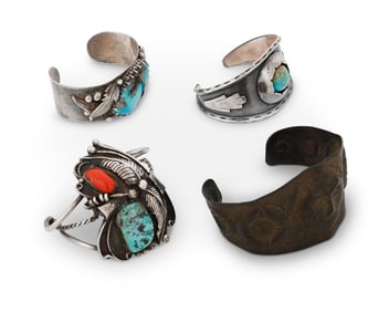 A group of Southwest-style sterling silver and mixed metal bracelets