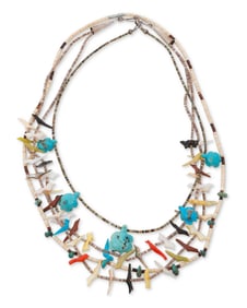 A group of Southwest-style carved stone and shell necklaces