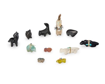 A group of Southwest Pueblo carved stone and pottery animal figures