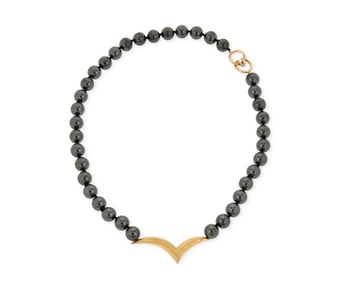 Tiffany & Co.: An 18K Gold and Hematite Necklace
