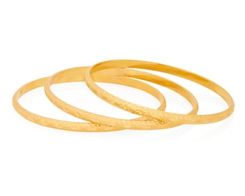 A Group of Three Gold Bangles