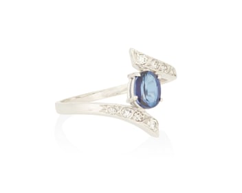 An 18K White Gold, Sapphire and Diamond Ring