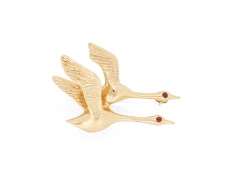 A Gold and Ruby Brooch