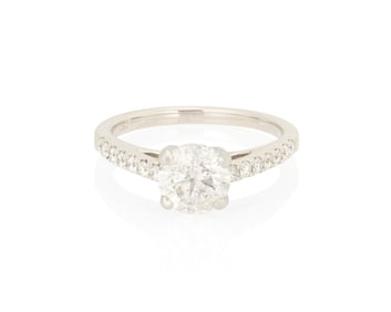A 18K White Gold and Diamond Ring