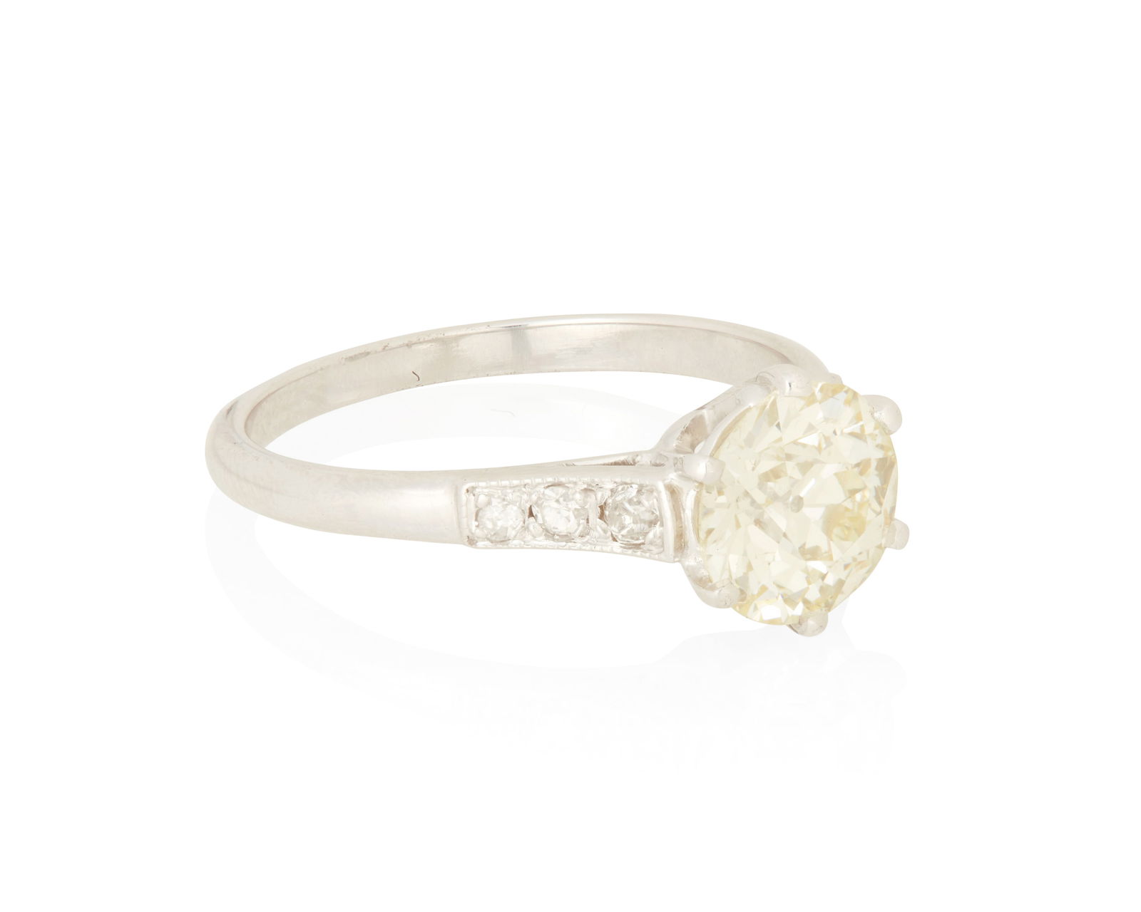 An 18K White Gold and Diamond Ring: An 18K White Gold and Diamond RingCentering an Old European-cut diamond weighing approximately 1.60 carats, accented by six round diamondsSize: 6 3/43.34 grams grossCenter Diamond:Approximate overall