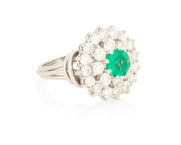 An 18K White Gold, Emerald and Diamond Ring