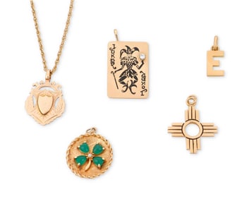A Group of Gold and Gem-Set Pendants
