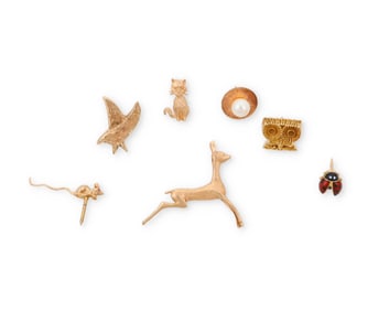 A Group of Gold Tie Tacks