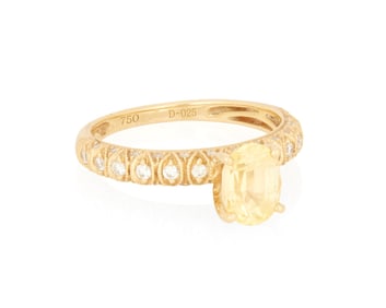 An 18K Gold, Yellow Sapphire and Diamond Ring