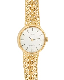 Tissot: An 18k Gold Wristwatch