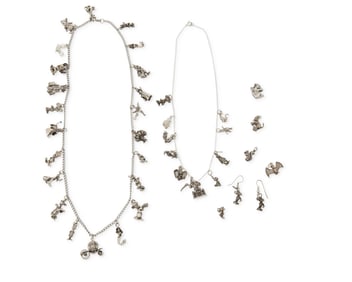 A Group of Sterling Silver Charm Jewelry Including Disney