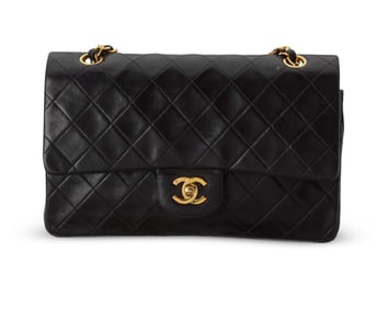 CHANEL: A Black Leather Medium 25 Timeless Classic Sac Rabat Double Flap Bag