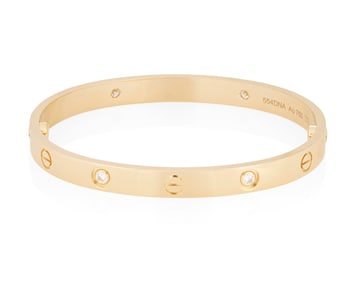 Cartier: An 18K Gold and Diamond 'Love' bangle