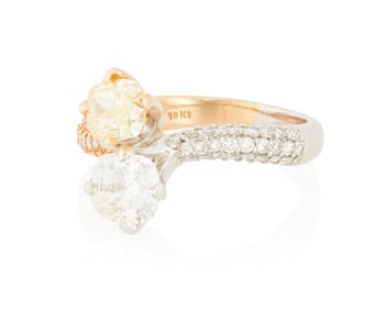 An 18K Bi-Color Gold, Fancy Yellow Diamond and Diamond Ring