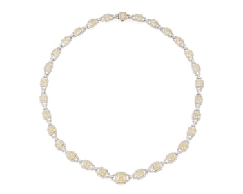 A Platinum, 18K Gold, Fancy Yellow Diamond and Diamond Necklace