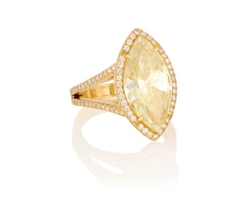 An 18K Gold, Yellow Diamond and Diamond Ring