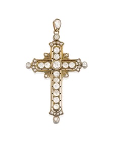 A Gold Topped-Silver and Diamond Cross Pendant