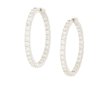 A Pair of 14K White Gold and Diamond Hoop Earrings