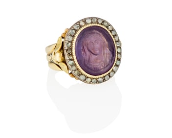 An 18K Gold, Amethyst and Diamond Ring