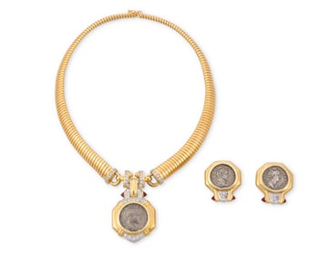 A 18K Gold, Silver Coin, Ruby and Diamond Set