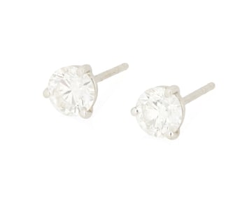 A Pair of White Gold, Platinum and Diamond Stud Earrings