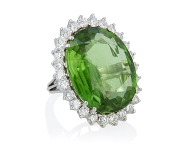 A Platinum, Peridot and Diamond Ring