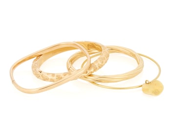 Four Gold Bangles
