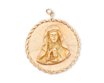 A 14K Gold Mother Mary Pendant
