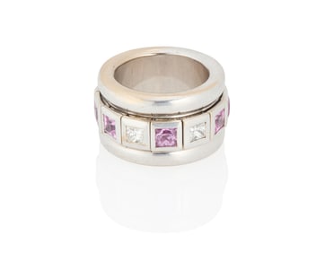 An 18K White Gold, Pink Sapphire and Diamond Ring