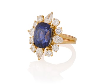 An 18K Gold, Sapphire and Diamond Ring