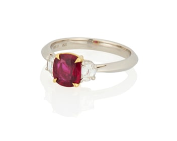 A Platinum, 18K Gold, Ruby and Diamond Ring