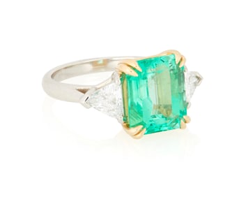 An 18K Gold and Platinum, Emerald and Diamond Ring